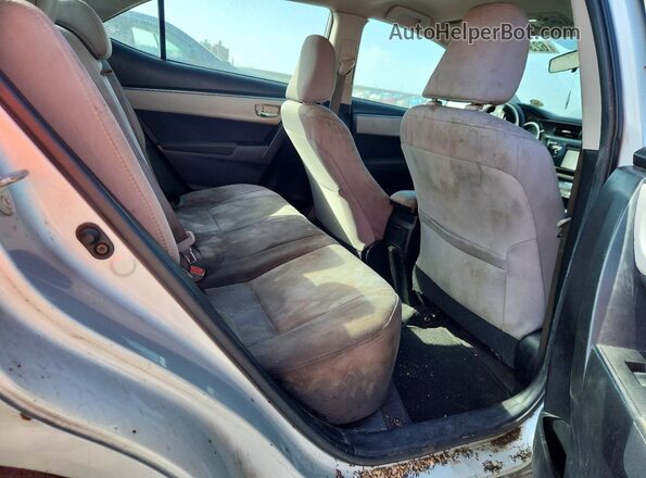 5YFBURHE2GP546039 2016 TOYOTA COROLLA Silver Vista interior trasera