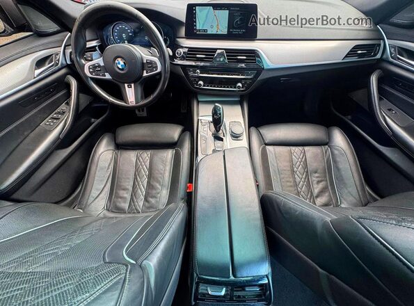 WBAJE7C50JG891256 2018 BMW 5 SERIES Charcoal Vista de los asientos traseros