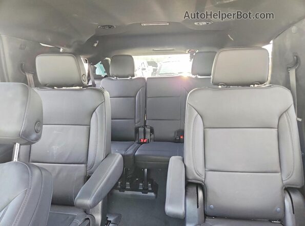 1GNSKPKLXRR249716 2024 CHEVROLET TAHOE Gray Սալոնի հետևի տեսք