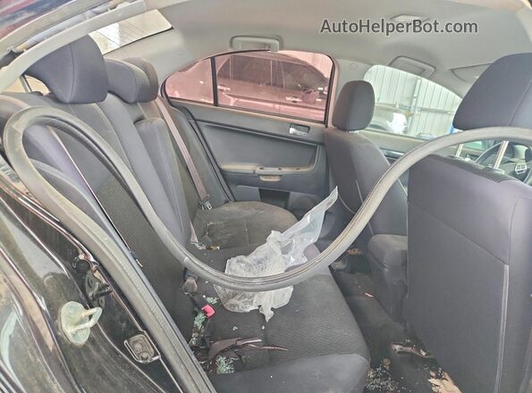 JA32U2FU3HU012259 2017 MITSUBISHI LANCER Black Widok wnętrza z tyłu