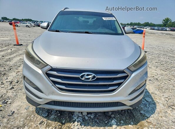 KM8J3CA25HU311078 2017 HYUNDAI TUCSON Silver Rear view
