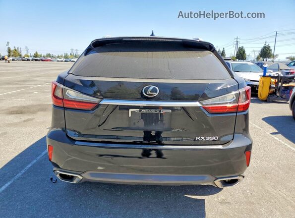 2T2ZZMCA6GC017907 2016 LEXUS RX Black Front interior view