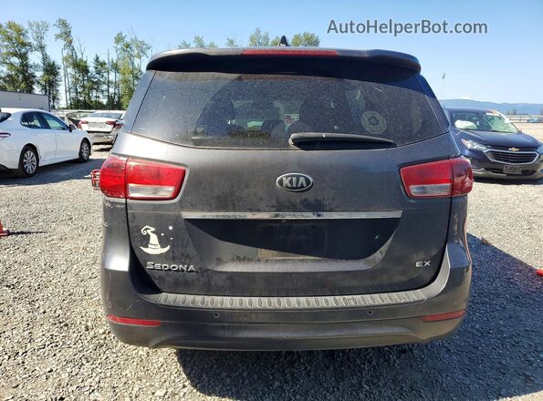 KNDMC5C11G6187251 2016 KIA SEDONA Серый Вид салона спереди