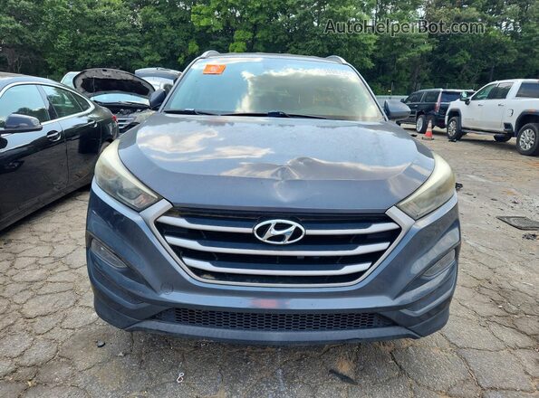 KM8J33A46JU663500 2018 HYUNDAI TUCSON Gray Widok z tyłu