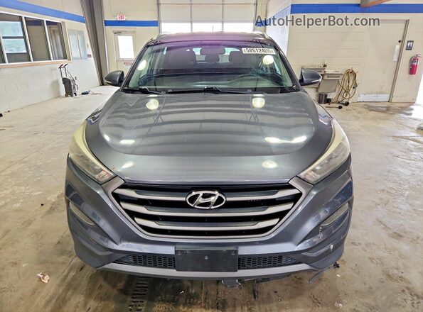 KM8J33A22GU183395 2016 HYUNDAI TUCSON Gray Rear view