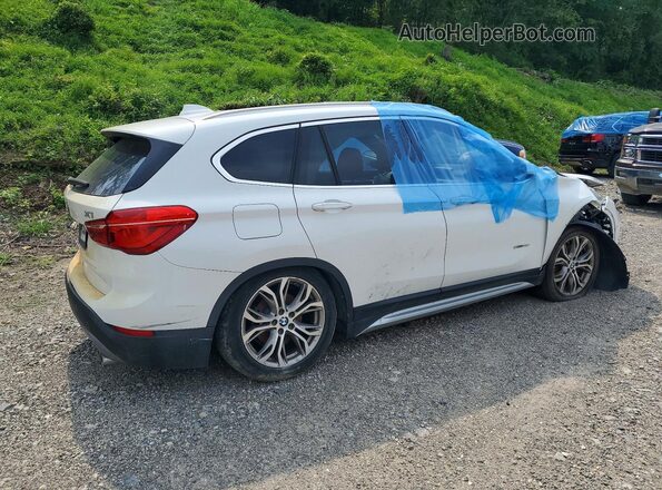 WBXHU7C37H5H37190 2017 BMW X1 White Delantero derecho