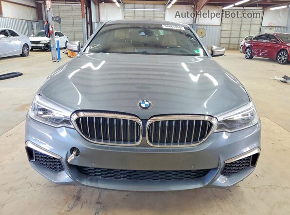 WBAJS7C06LCD37892 2020 BMW M5 Blue Հետևի տեսք