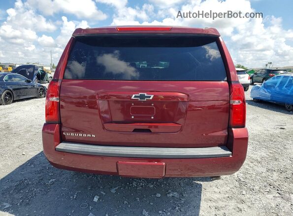 1GNSCHKC0KR395423 2019 CHEVROLET SUBURBAN Red Front interior view