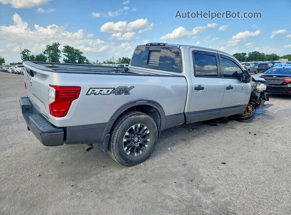 1N6BA1F41KN510589 2019 NISSAN TITAN Silver Delantero derecho