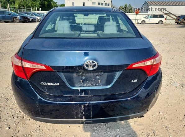 2T1BURHE4KC163020 2019 TOYOTA COROLLA Синий Вид салона спереди