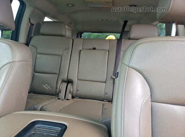 1GKS2GKC5KR252980 2019 GMC YUKON Silver Widok wnętrza z tyłu