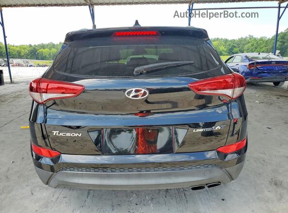 KM8J3CA2XGU192300 2016 HYUNDAI TUCSON Black Вид салону спереду