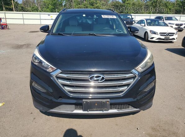 KM8J3CA27GU134256 2016 HYUNDAI TUCSON Black Vista trasera