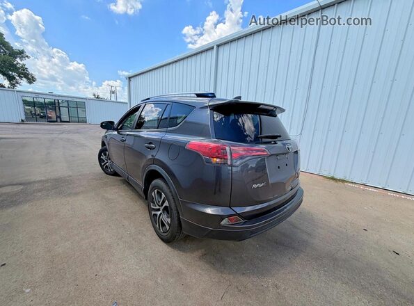 JTMZFREV7HJ713028 2017 TOYOTA RAV4 Gray Delantero derecho