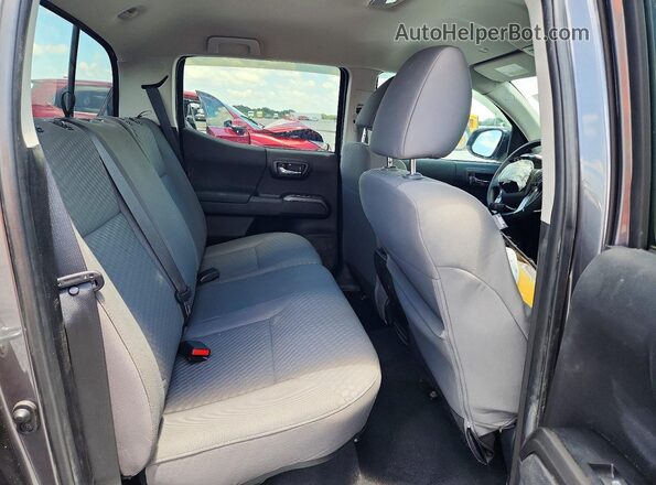 3TYCZ5AN8PT110719 2023 TOYOTA TACOMA Black Rear interior view