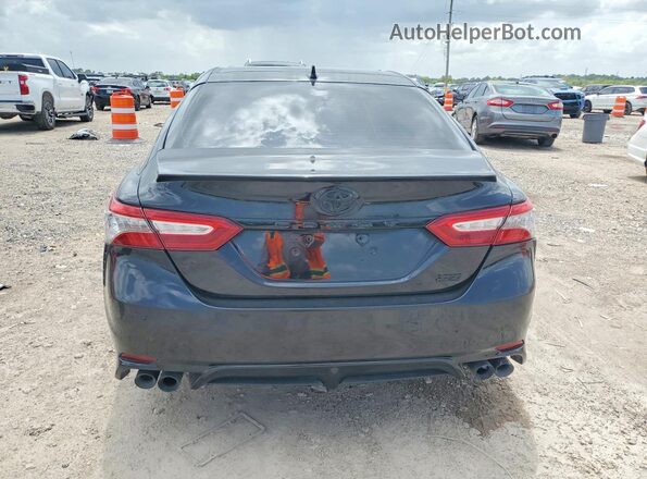 4T1B61HK6KU813059 2019 TOYOTA CAMRY Черный Вид салона спереди