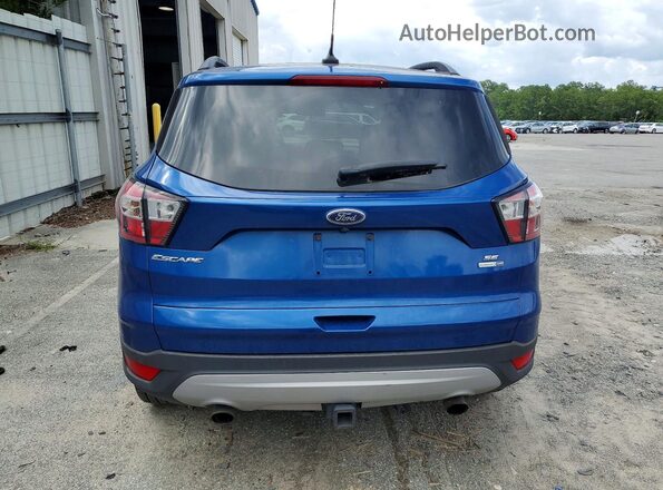 1FMCU9GD8JUB35182 2018 FORD ESCAPE Blue Vista interior delantera