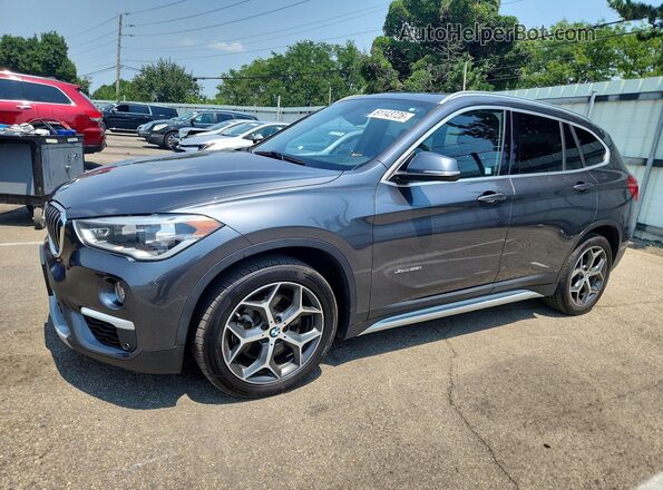 WBXHT3C30J5K25396 2018 BMW X1 Gray Rear left