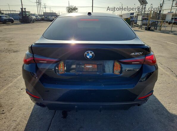 WBA63AV07NFM62332 2022 BMW 4 SERIES Black Вид салону спереду