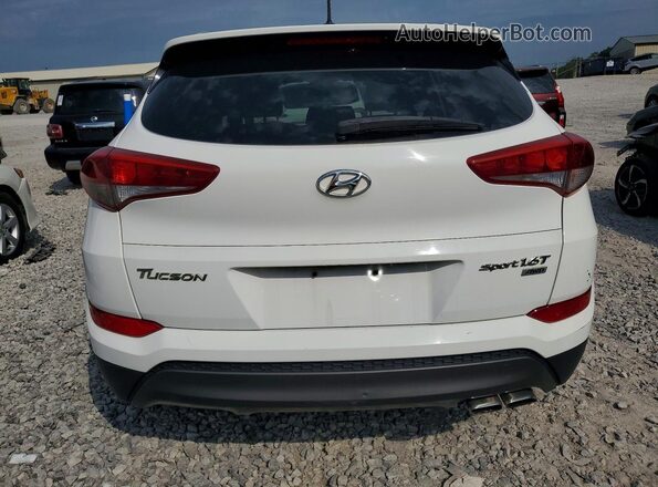 KM8J3CA20GU055382 2016 HYUNDAI TUCSON White Front interior view