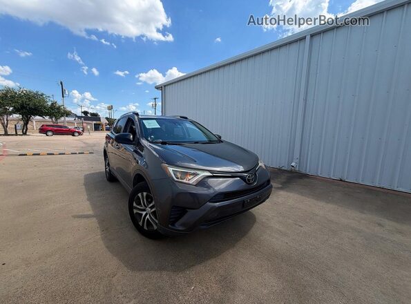 JTMZFREV7HJ713028 2017 TOYOTA RAV4 Gray Trasero izquierdo