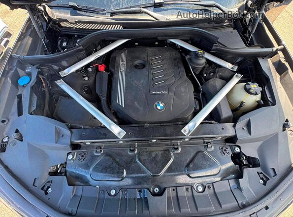 5UXCW2C02L9B52589 2020 BMW X7 Черный Вид салона спереди