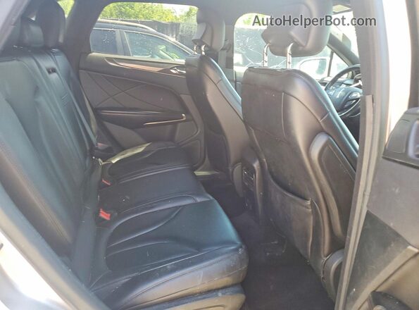 5LMCJ1C99HUL28864 2017 LINCOLN MKC Silver Rear interior view