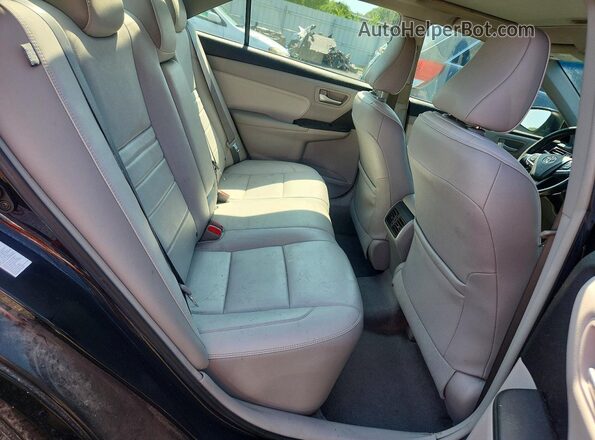 4T1BF1FK2HU678898 2017 TOYOTA CAMRY Black Սալոնի հետևի տեսք
