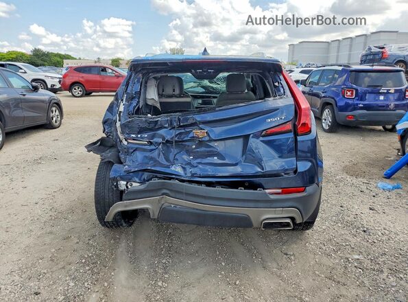 1GYFZCR43MF028086 2021 CADILLAC XT4 Blue Vista interior delantera
