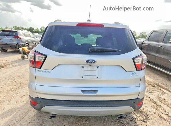 1FMCU0GD2JUB29289 2018 FORD ESCAPE Silver Front interior view
