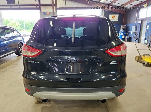 1FMCU9GX5GUA41568 2016 FORD ESCAPE Black Front interior view