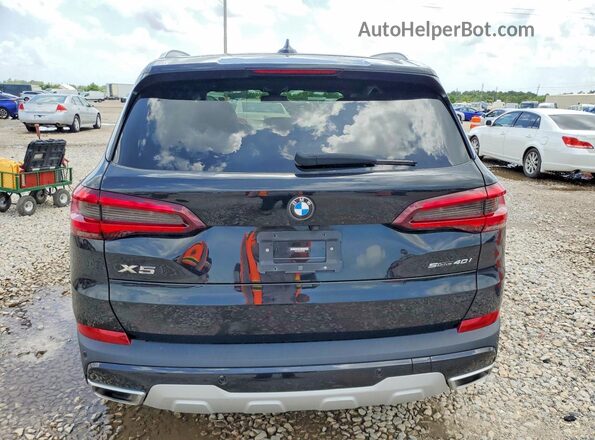 5UXCR4C00P9P36995 2023 BMW X5 Black Widok wnętrza z przodu