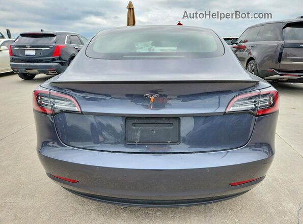 5YJ3E1EA7MF093886 2021 TESLA MODEL Gray Front interior view