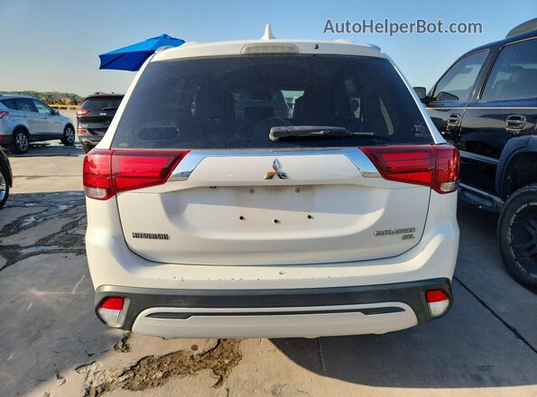 JA4AZ3A36KZ036188 2019 MITSUBISHI OUTLANDER Белый Вид салона спереди