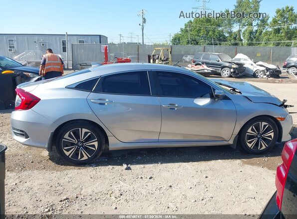 19XFC1F32HE016938 2017 HONDA CIVIC Серебряный Вид задней части салона