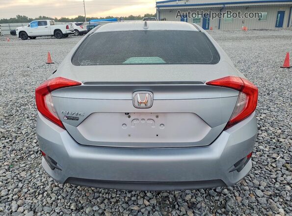 19XFC1F34GE033285 2016 HONDA CIVIC Silver Rear view