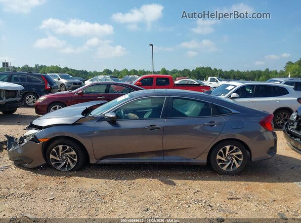 19XFC2F7XHE017991 2017 HONDA CIVIC Gray Սալոնի հետևի տեսք