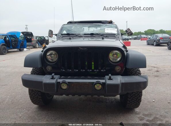 1C4AJWAG3GL308644 2016 JEEP WRANGLER Gray Widok wnętrza z tyłu
