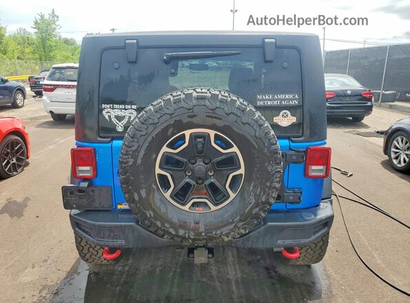 1C4BJWCG3GL218864 2016 JEEP WRANGLER Blue Rear view