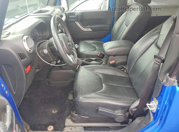 1C4BJWCG3GL218864 2016 JEEP WRANGLER Blue Front interior view