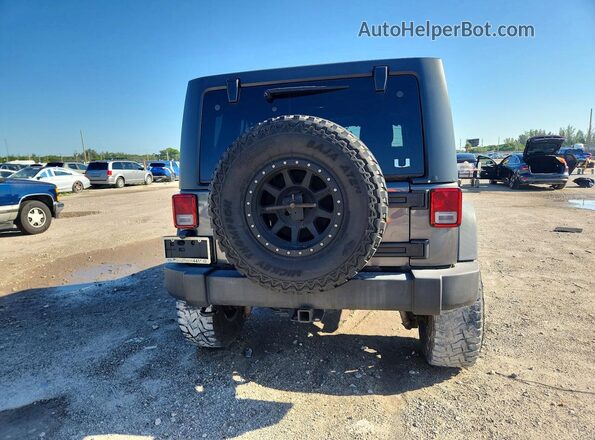 1C4BJWDG1GL167203 2016 JEEP WRANGLER Gray Rear view