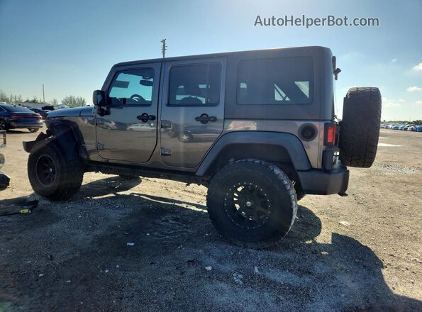1C4BJWDG1GL167203 2016 JEEP WRANGLER Gray Rear left