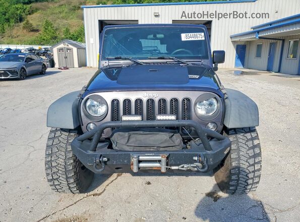 1C4BJWDG1GL178833 2016 JEEP WRANGLER Gray Вид спереду