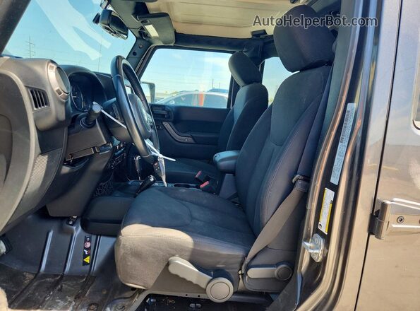 1C4BJWDG3GL248994 2016 JEEP WRANGLER Gray Вид салону спереду