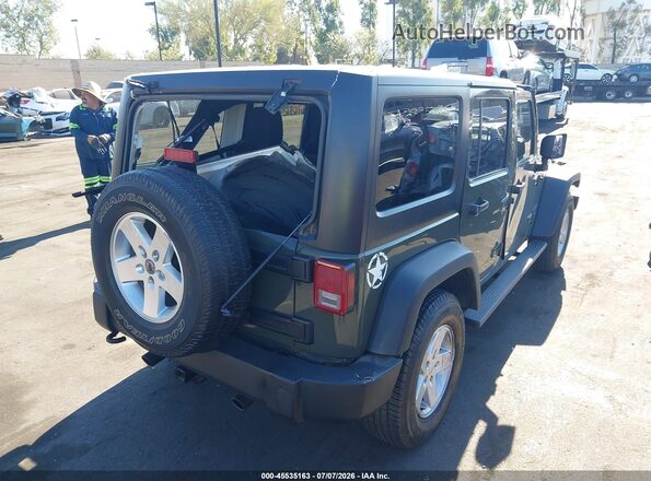 1C4BJWDG4GL101471 2016 JEEP WRANGLER UNLIMITED Green Rear interior view