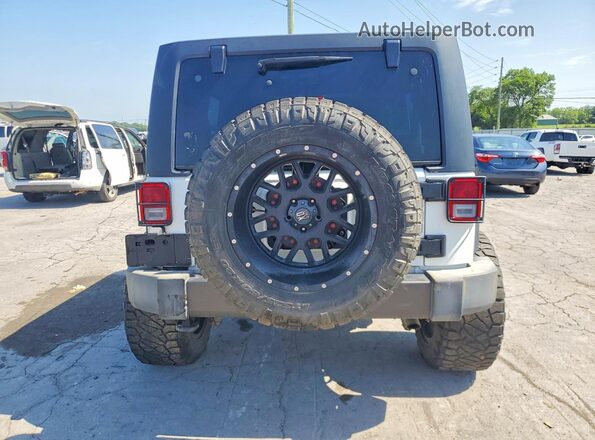 1C4BJWDG4GL177840 2016 JEEP WRANGLER Silver Вид ззаду
