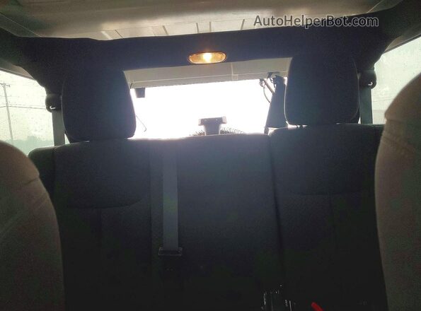1C4BJWDG6GL105991 2016 JEEP WRANGLER Silver Rear seats view