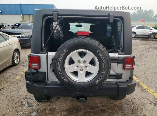 1C4BJWDG6GL105991 2016 JEEP WRANGLER Silver Rear view