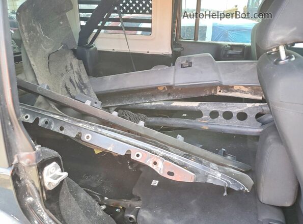 1C4BJWDG7GL155668 2016 JEEP WRANGLER Черный Вид задней части салона