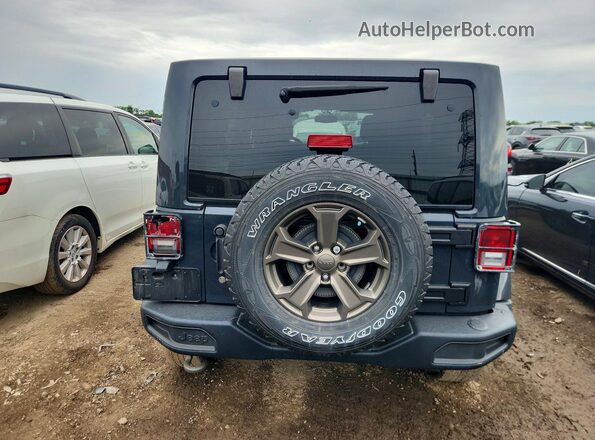 1C4BJWDG8JL879716 2018 JEEP WRANGLER Blue Widok z tyłu